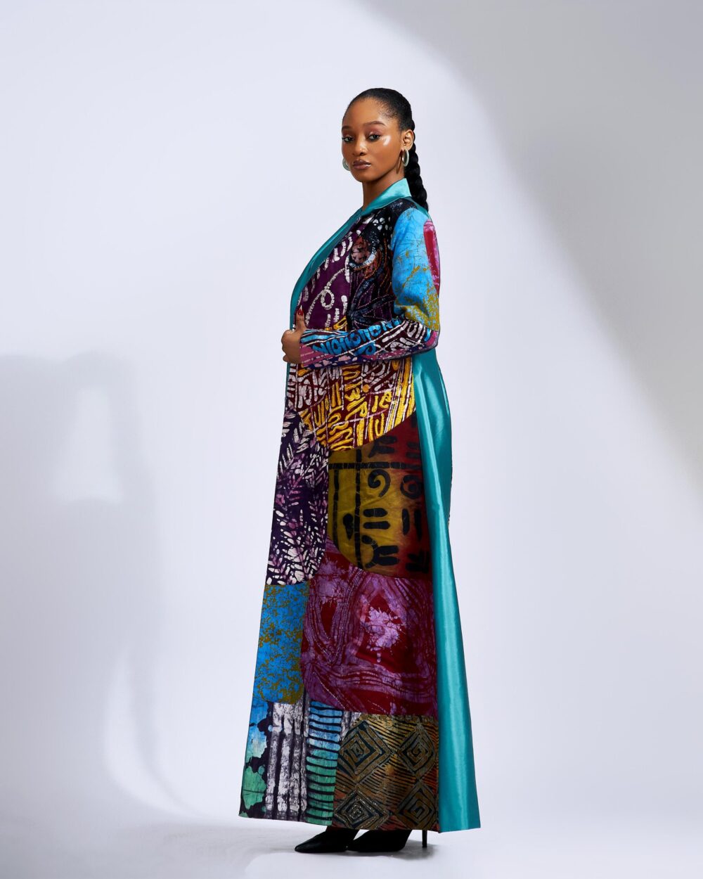 Maxi Patchwork Coat Paired With a Teal Column Skirt - Image 3