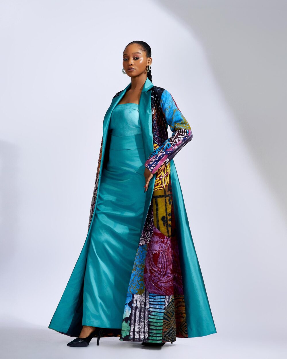 Maxi Patchwork Coat Paired With a Teal Column Skirt - Image 2